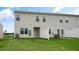 Home's rear exterior featuring a fenced yard and patio at 164 Starlight St, Sanford, NC 27330