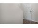 Bright entryway showcasing hardwood floors, fresh paint, and a secure door lock at 164 Starlight St, Sanford, NC 27330