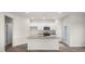 Bright kitchen with a large island, granite countertops and stainless steel appliances at 164 Starlight St, Sanford, NC 27330