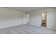 Spacious bedroom boasts neutral carpet, and access to the bathroom and walk-in closet at 165 Klamath Dr, Garner, NC 27529