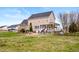 Expansive backyard featuring an outdoor patio and a pergola at 170 Blande Dr, Kenly, NC 27542