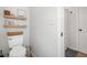 Cozy bathroom featuring a toilet and built in shelves at 170 Blande Dr, Kenly, NC 27542