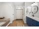 Bright bathroom with double vanity, soaking tub, and shower at 170 Blande Dr, Kenly, NC 27542