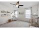 Charming bedroom with a rocker, baby mobile, and natural light at 170 Blande Dr, Kenly, NC 27542