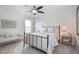Inviting bedroom with metal bed frame, and unique wall decor at 170 Blande Dr, Kenly, NC 27542