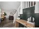 Stylish entryway showcasing a modern staircase, console table, and decorative accents at 170 Blande Dr, Kenly, NC 27542