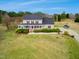 Beautiful home boasts well-manicured landscaping and a welcoming front porch at 170 Blande Dr, Kenly, NC 27542