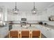 Modern kitchen with white cabinets, granite countertops and stainless steel appliances at 170 Blande Dr, Kenly, NC 27542