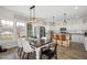 Spacious kitchen and dining area with stainless appliances, granite countertops and lots of natural light at 170 Blande Dr, Kenly, NC 27542