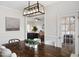 Welcoming living room with a comfortable leather sofa and an open floor plan at 170 Blande Dr, Kenly, NC 27542