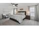 Comfortable bedroom with ceiling fan, seating, and stylish furnishings at 170 Blande Dr, Kenly, NC 27542
