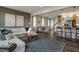 Spacious open floor plan showcases seamless flow between the living room, dining area, and modern kitchen at 180 Kobus Ct, Garner, NC 27529