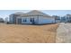 Spacious backyard with a newly seeded lawn at 185 White Birch Ln, Angier, NC 27501