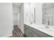 This bathroom features double sinks, updated cabinets, and updated fixtures at 185 White Birch Ln, Angier, NC 27501