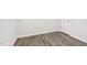 Bedroom with hard wood flooring and door at 185 White Birch Ln, Angier, NC 27501