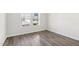 Bedroom with hard wood flooring and window at 185 White Birch Ln, Angier, NC 27501