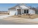 Single Gathering home with brick and siding exterior and attached two car garage on small lot at 185 White Birch Ln, Angier, NC 27501