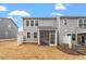 A cozy screened porch and an open backyard highlight the outdoor living space at 193 Millennium Dr, Pittsboro, NC 27312
