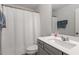 Bathroom with a combined shower and tub, featuring a white curtain at 193 Millennium Dr, Pittsboro, NC 27312