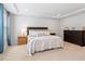 Well-lit bedroom with neutral tones, offering a calming and inviting space at 193 Millennium Dr, Pittsboro, NC 27312