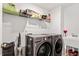 Functional laundry room with modern appliances and ample storage space at 193 Millennium Dr, Pittsboro, NC 27312