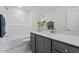 Neat bathroom with granite counters, a tub and shower combo, and modern fixtures at 20 Diamond Creek Dr, Zebulon, NC 27597