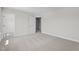 Neutral carpeted bedroom with white trim and doors, ready for personalization at 20 Diamond Creek Dr, Zebulon, NC 27597