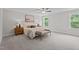 Well-lit bedroom features soft carpet, a neutral palette and comfortable furniture at 20 Diamond Creek Dr, Zebulon, NC 27597