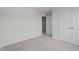 Carpeted bedroom with large closet space and neutral paint, ready for a new owner at 20 Diamond Creek Dr, Zebulon, NC 27597