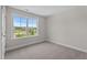 Bright, airy bedroom with soft carpet and large windows offer a view to the outdoors at 20 Diamond Creek Dr, Zebulon, NC 27597
