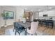 Cozy dining area with a large window, elegant furniture, and plenty of natural light at 20 Diamond Creek Dr, Zebulon, NC 27597