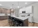 Spacious kitchen featuring a large center island, stylish pendant lighting, and modern appliances at 20 Diamond Creek Dr, Zebulon, NC 27597