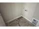A cozy laundry room ready for appliances, featuring a functional layout and clean design at 20 Diamond Creek Dr, Zebulon, NC 27597