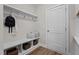 The mud room offers built-in storage, a bench, and hooks for organizing at 20 Diamond Creek Dr, Zebulon, NC 27597