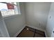 Compact room showcasing fresh paint and a window, perfect for customization and various uses at 20 Diamond Creek Dr, Zebulon, NC 27597