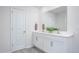 Bathroom with a double sink vanity, framed mirror, and white cabinets at 2160 Monk Dr, Haw River, NC 27258