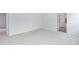Spacious bedroom showcasing a view of the attached bathroom with a tile floor at 2160 Monk Dr, Haw River, NC 27258