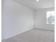 Cozy bedroom with plush carpeting, a window, and neutral paint at 2160 Monk Dr, Haw River, NC 27258