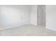Bright bedroom with neutral carpet and a view of an open doorway at 2160 Monk Dr, Haw River, NC 27258