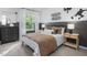 Decorated bedroom featuring stylish fixtures, skateboards, and wall art at 2168 Monk Dr, Haw River, NC 27258