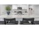 Stylish kitchen features granite countertops, stainless steel appliances, and a convenient breakfast bar at 2168 Monk Dr, Haw River, NC 27258