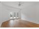 Bright bedroom with access to a balcony and wood floors at 222 Glenwood Avenue # 218, Raleigh, NC 27603