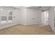 Bedroom features carpet floors, natural light and closet at 222 Glenwood Avenue # 218, Raleigh, NC 27603