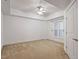 Bedroom with carpet floors, ceiling fan, and natural light at 222 Glenwood Avenue # 218, Raleigh, NC 27603
