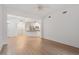 Spacious living area with wood floors and access to the kitchen and door at 222 Glenwood Avenue # 218, Raleigh, NC 27603