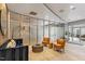 Cozy lobby area with contemporary furnishings, large windows, and stylish decor at 222 Glenwood Avenue # 218, Raleigh, NC 27603