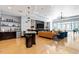 Bright lounge with a kitchenette, comfortable seating, and entertainment setup at 222 Glenwood Avenue # 218, Raleigh, NC 27603