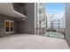 Large patio area overlooking the community pool at 222 Glenwood Avenue # 218, Raleigh, NC 27603