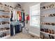 Walk-in closet with custom shelving and ample storage space at 244 Winding Oak Way, Clayton, NC 27520