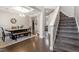 Open floor plan showcasing the dining room, staircase, and hardwood floors at 244 Winding Oak Way, Clayton, NC 27520
